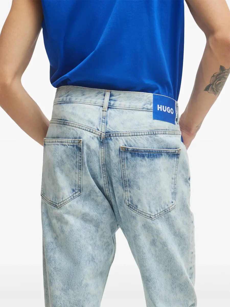 acid-wash straight-leg jeans 9