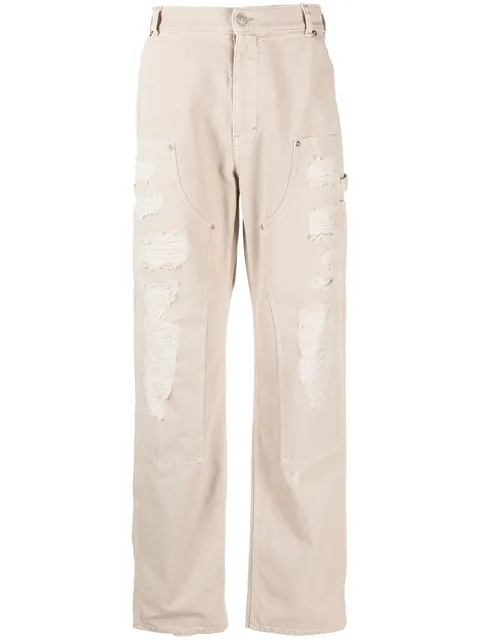 Destroyed canvas ripped carpenter trousers