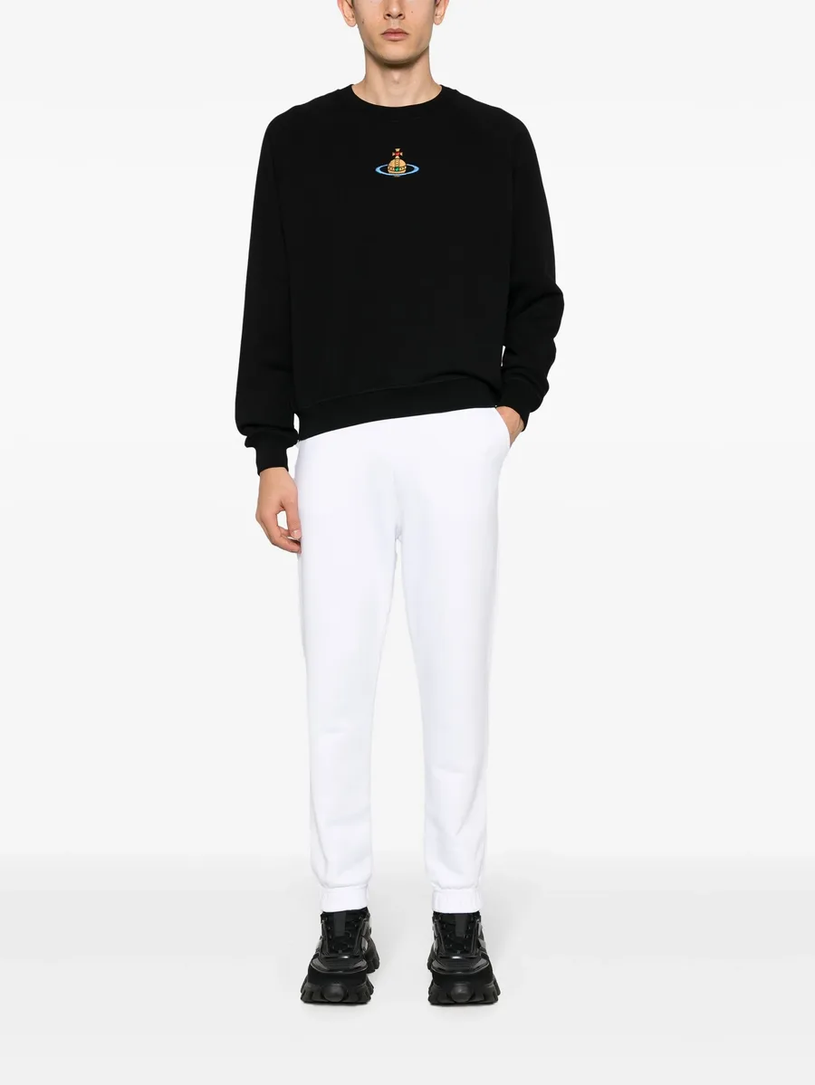 Orb-embroidered cotton track pants 4