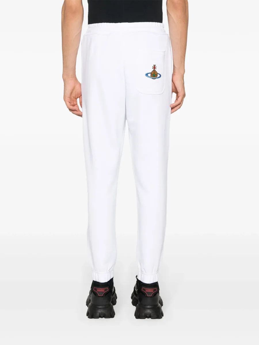 Orb-embroidered cotton track pants 7
