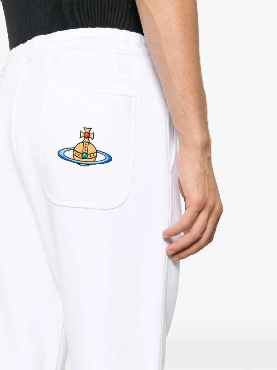 Orb-embroidered cotton track pants 10