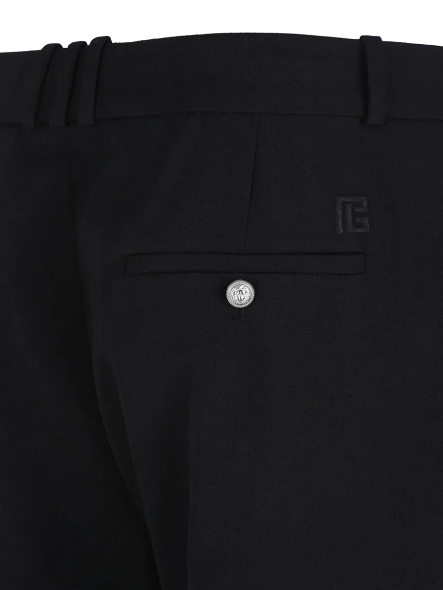 button-fastening wool trousers 8