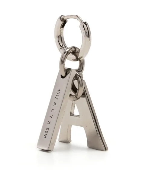 A charm pendant earring