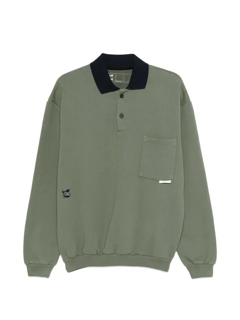 chest-pocket buttoned polo top