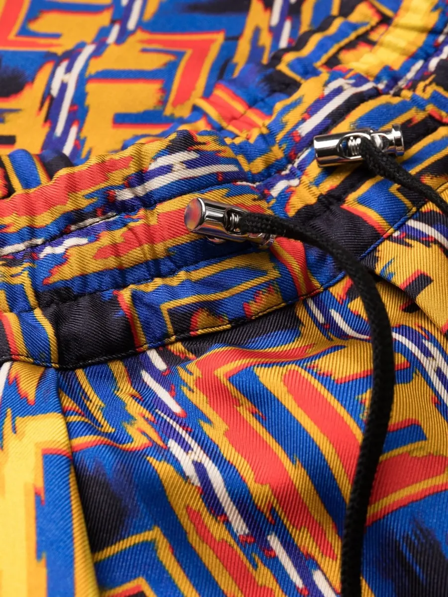 graphic-print cropped trousers 11