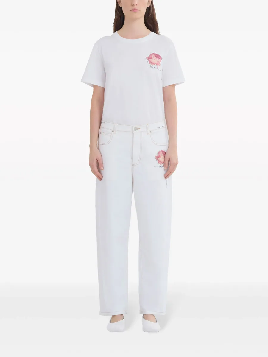 appliquéd tapered jeans 5