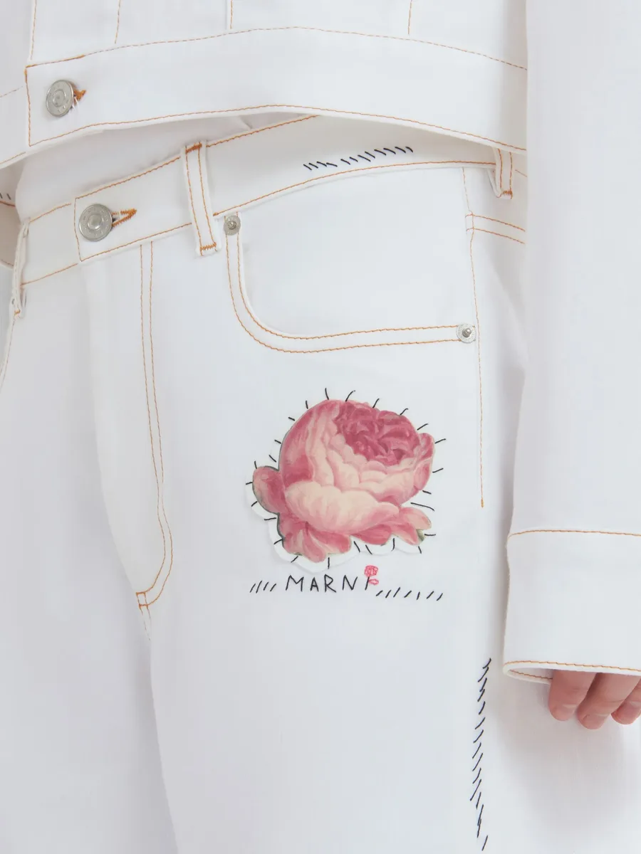 appliquéd tapered jeans 9