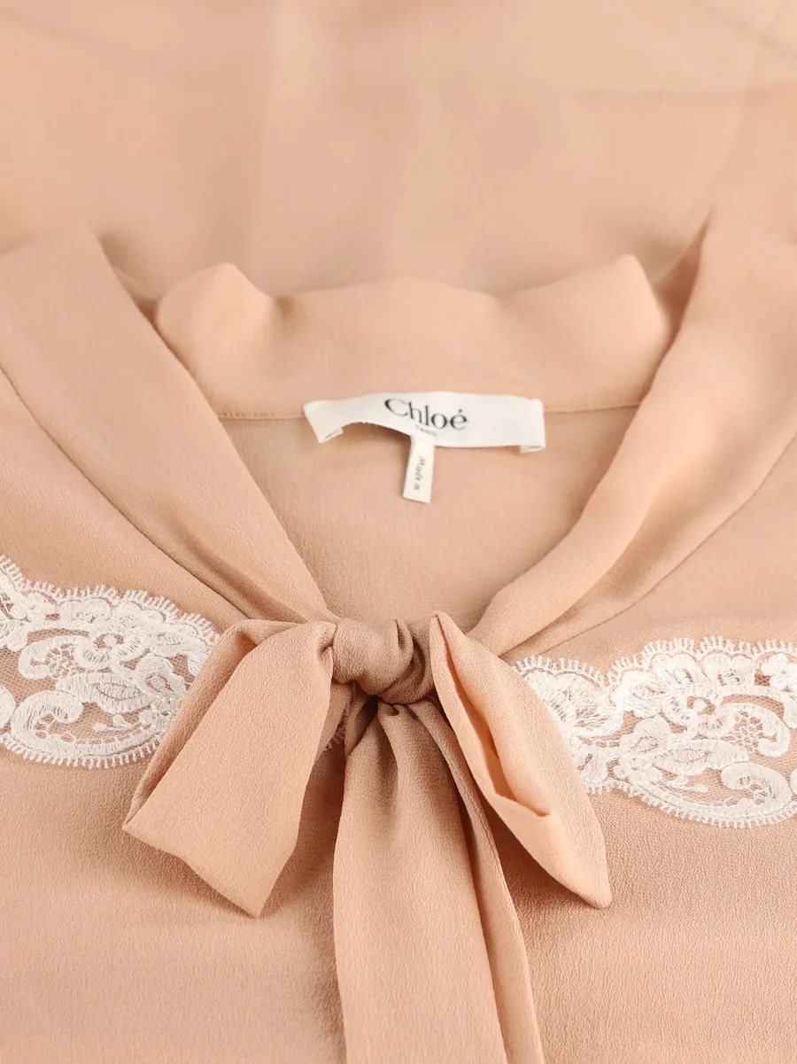lace-trim tie-neck shirt 8