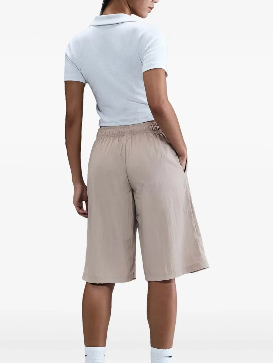 Swoosh-embroidered elastic-waist shorts 6