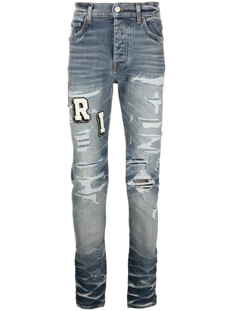 Varsity ripped skinny jeans