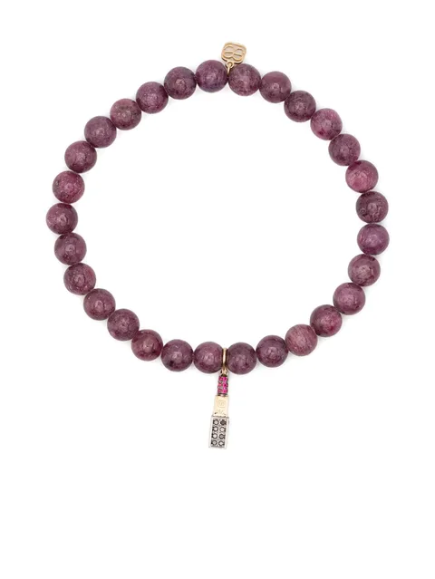 14CT yellow gold diamond and ruby charm bracelet
