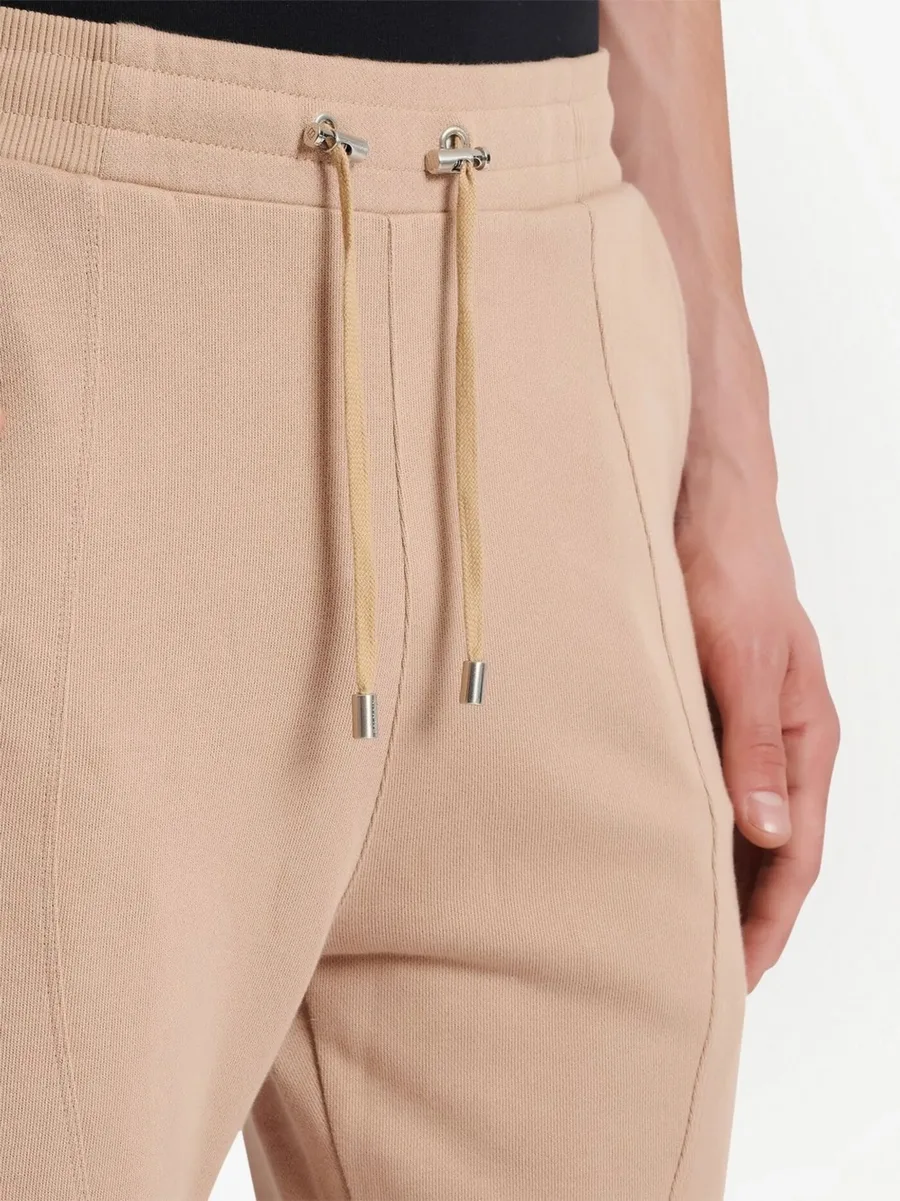 embossed logo track pants 12