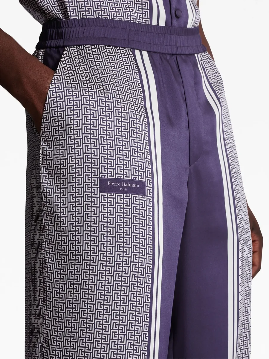 vertical-print straight-leg trousers 11