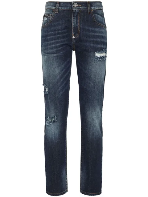 distressed-effect denim trousers
