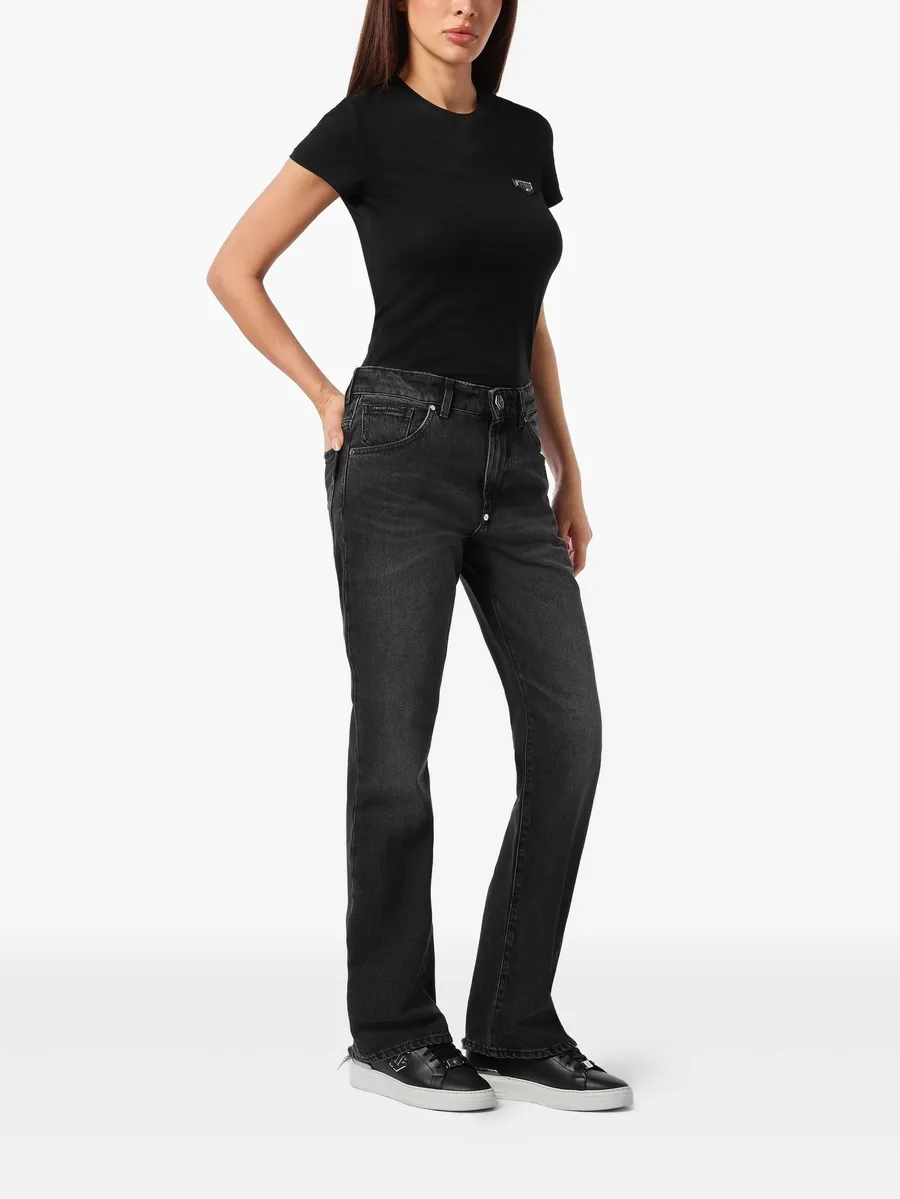 whiskering-effect jeans 3