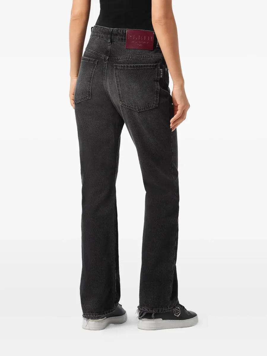 whiskering-effect jeans 8