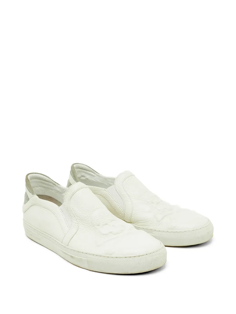 skull-embossed slip-on sneakers 4