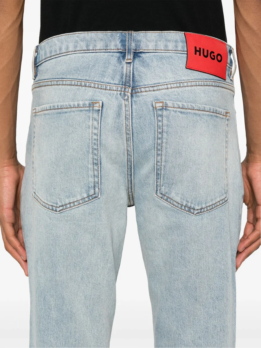 slim-leg cotton-blend jeans 10
