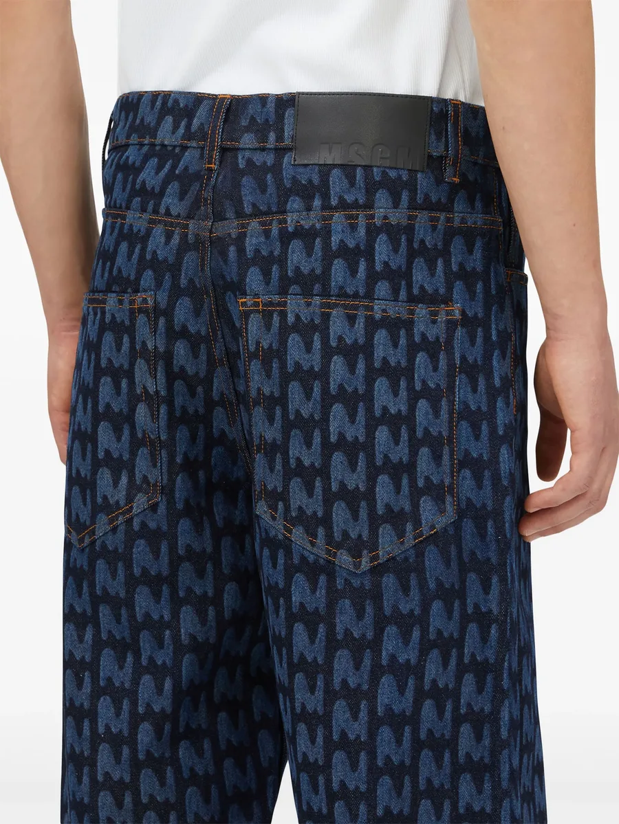 monogram-print cotton jeans 9