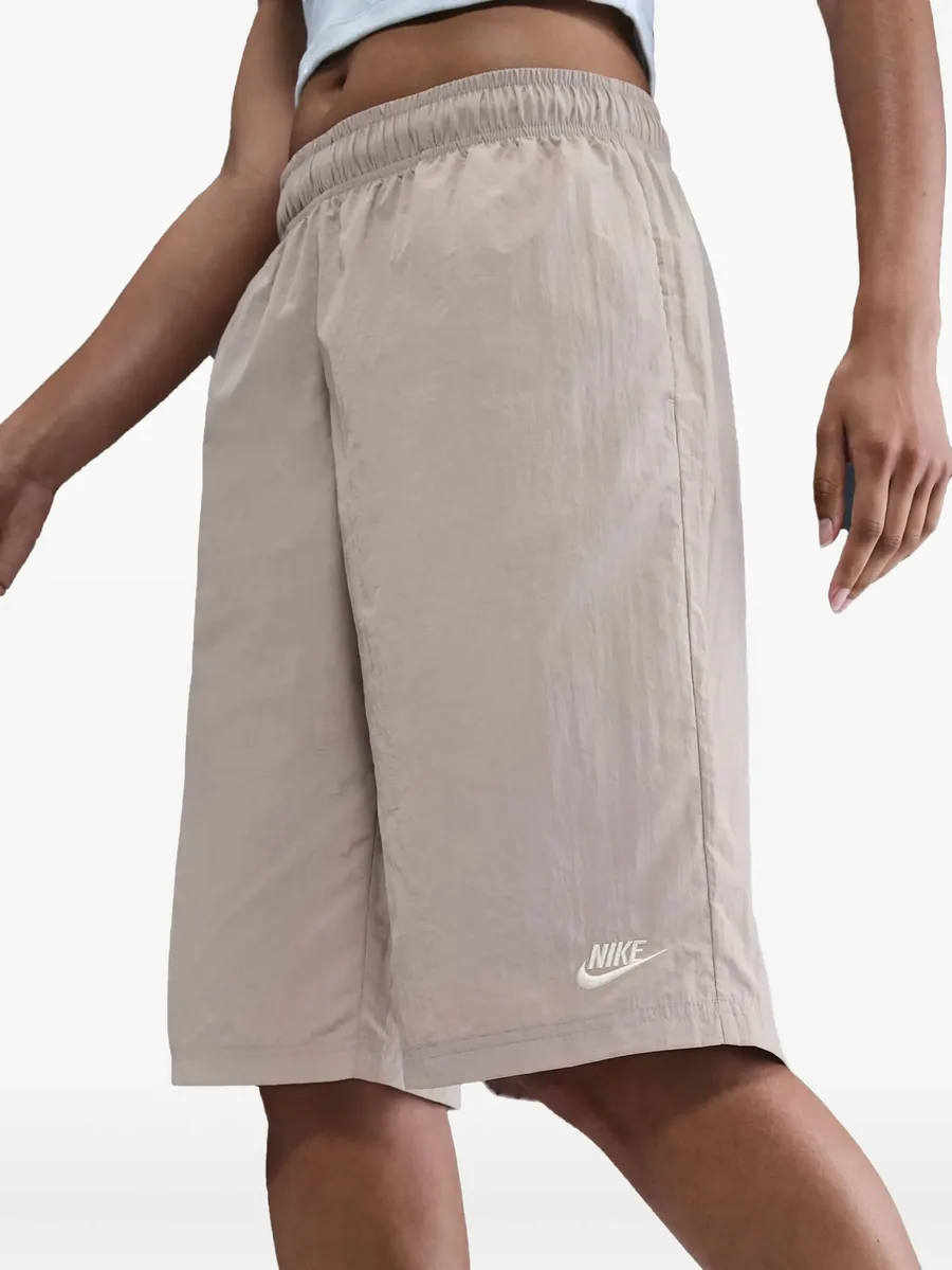 Swoosh-embroidered elastic-waist shorts 8