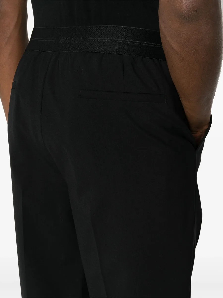 logo-waistband tapered trousers 9
