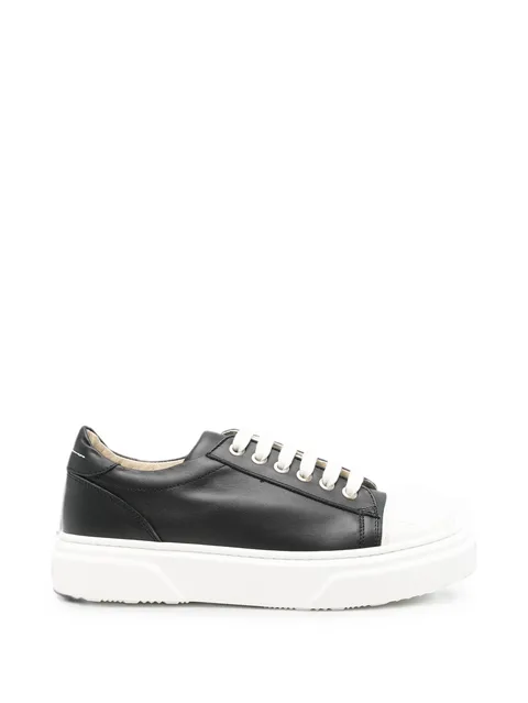 logo-embossed panelled sneakers