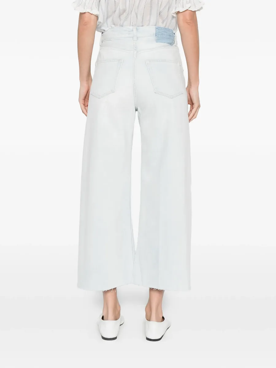 distressed denim trousers 7