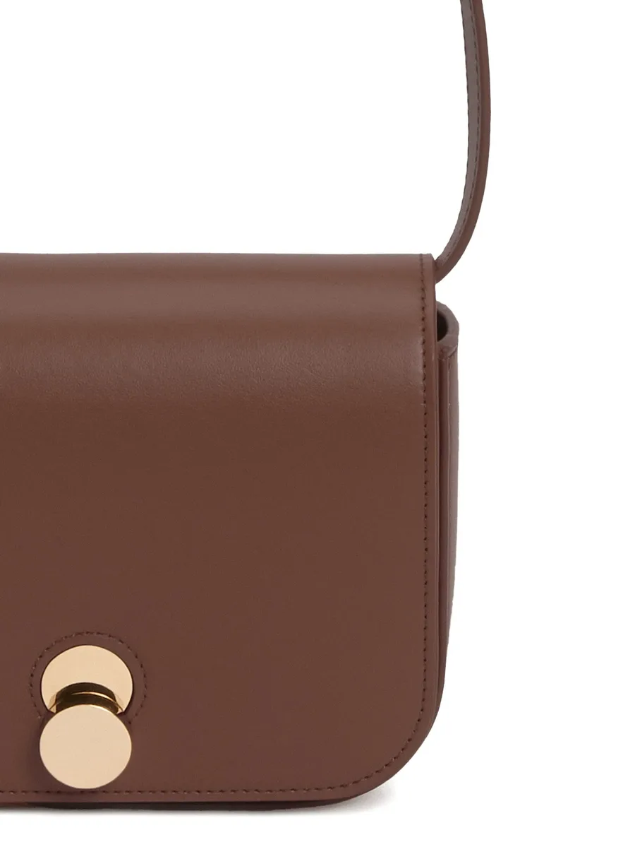 Eclissi curved-flap leather shoulder bag 9