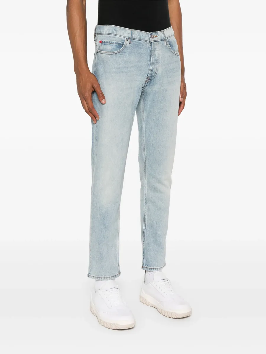 slim-leg cotton-blend jeans 5