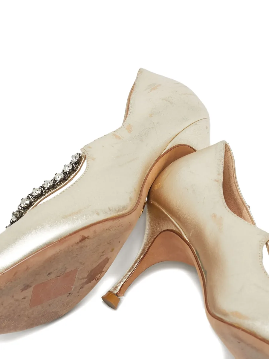 pointed-toe crystal pumps 9