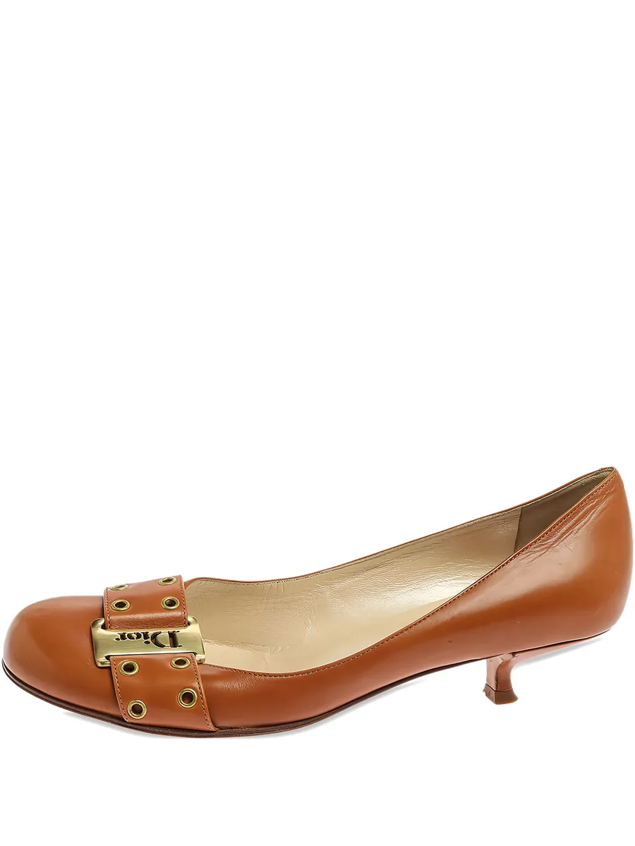 buckled grommet pumps 1