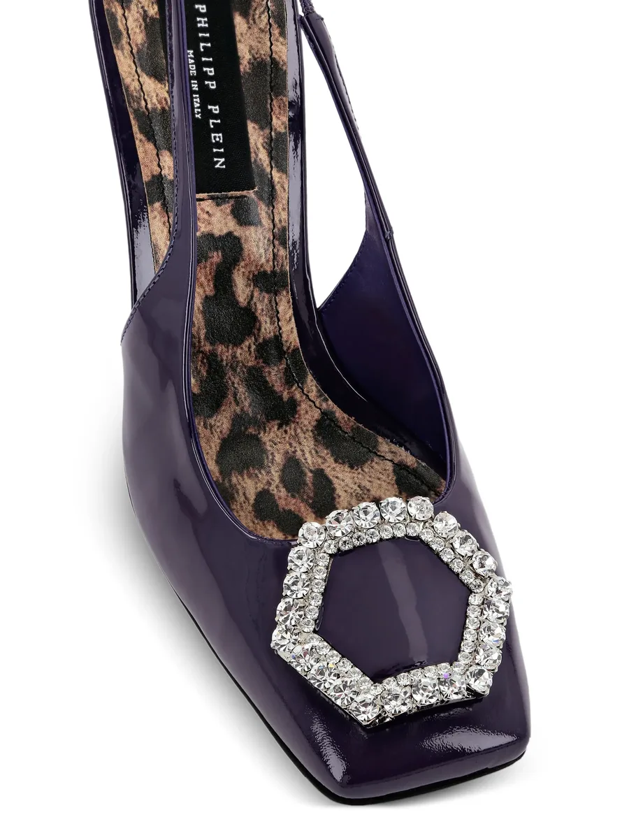 Decollete heeled pumps 6