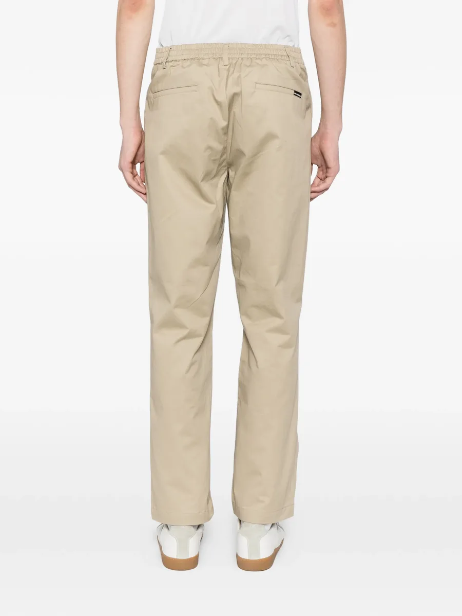 logo-plaqued chino trousers 7