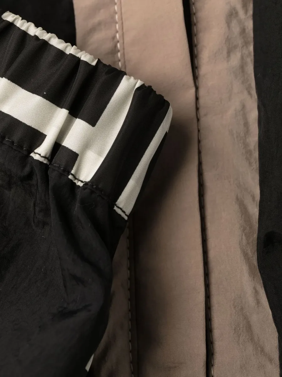 colour-blocked monogram track pants 14
