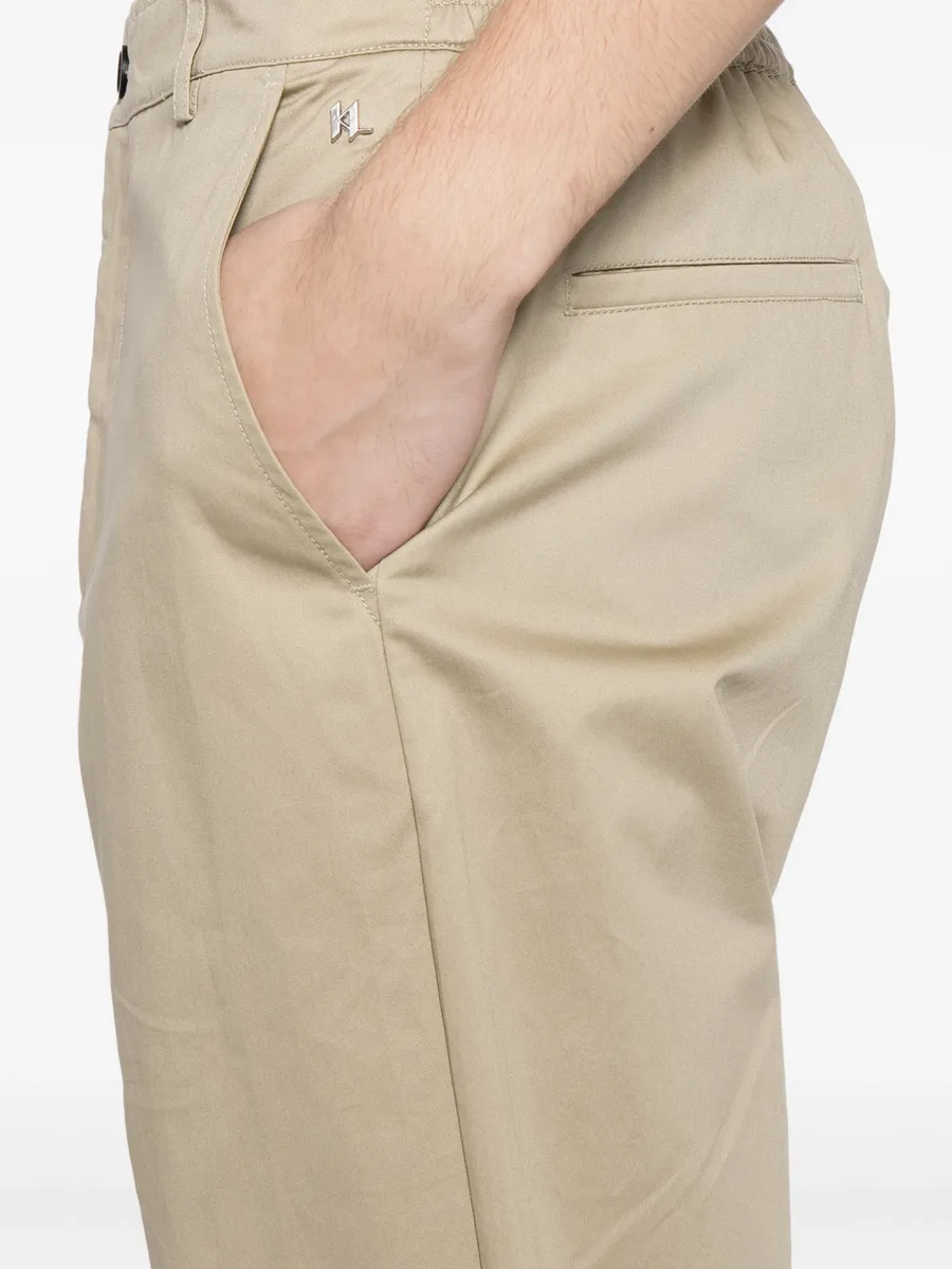logo-plaqued chino trousers 10