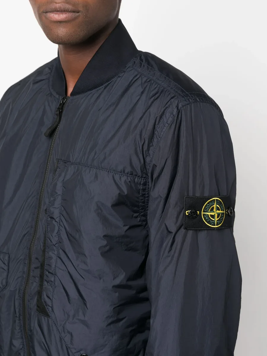 Compass-badge panelled bomber jacket 10
