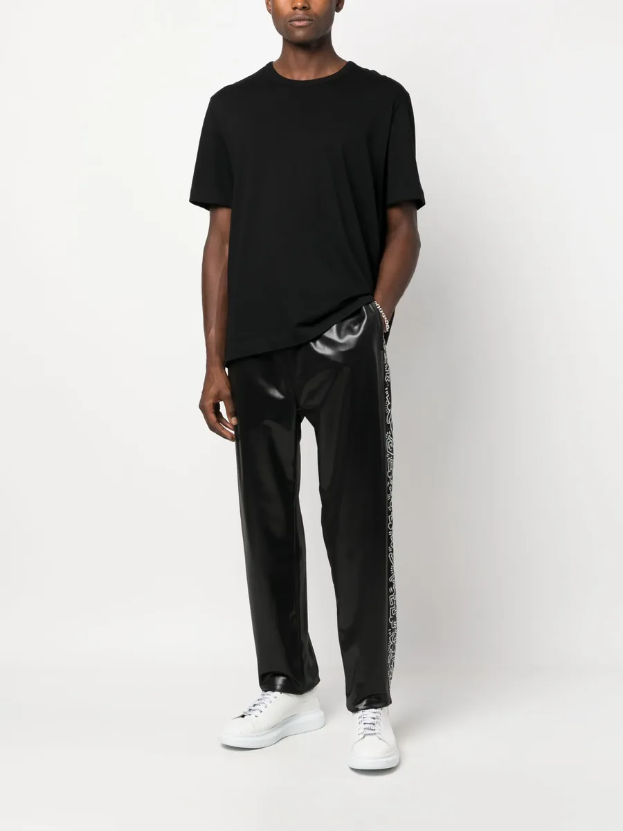 спортивные брюки с принтом из коллаборации с Keith Haring 3