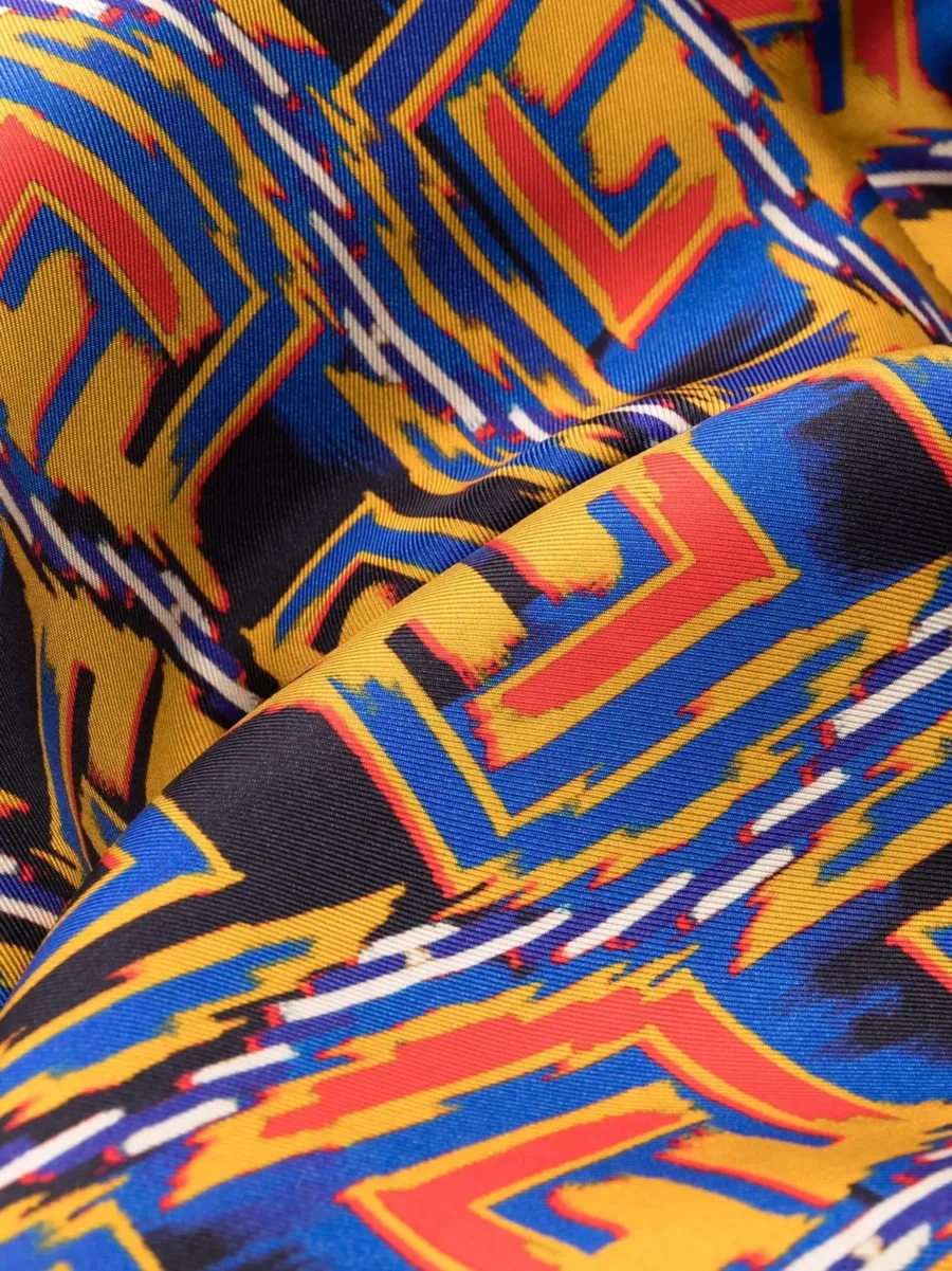 graphic-print cropped trousers 13