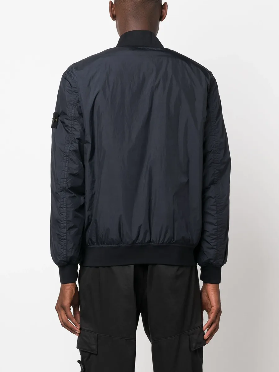 Compass-badge panelled bomber jacket 7