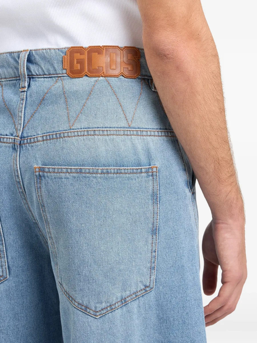 stone-washed wide-leg jeans 8