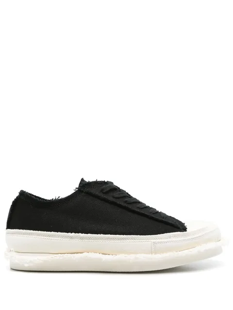 frayed sneakers