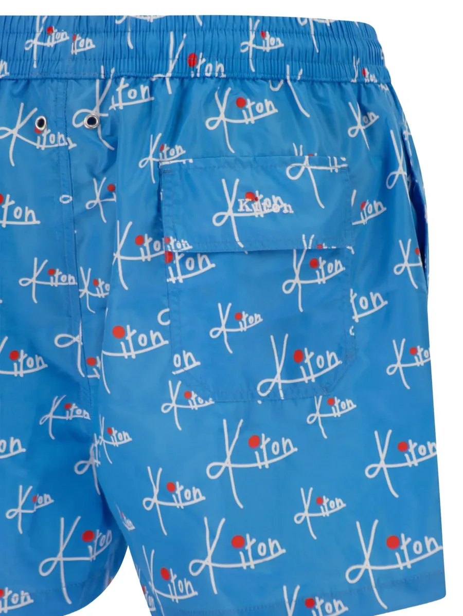 patterned swim shorts 8