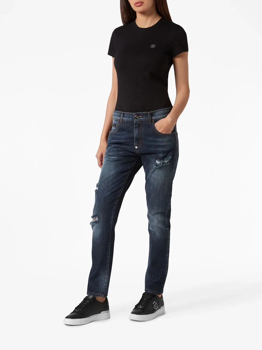distressed-effect denim trousers 3