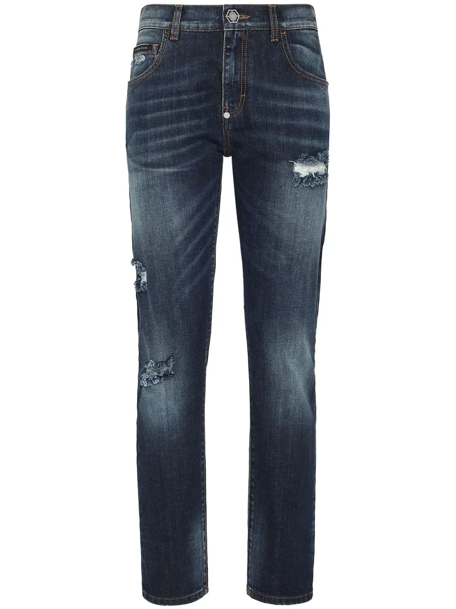 distressed-effect denim trousers 1