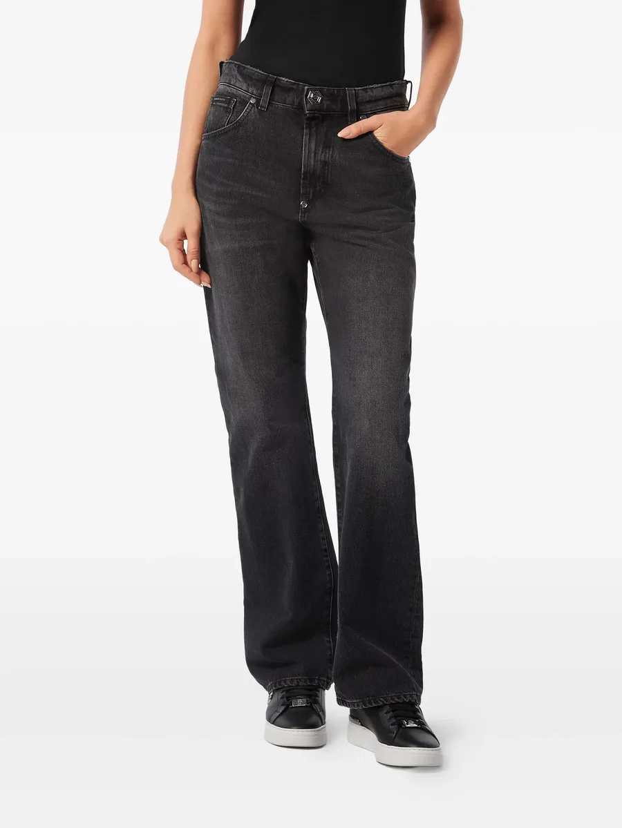 whiskering-effect jeans 6