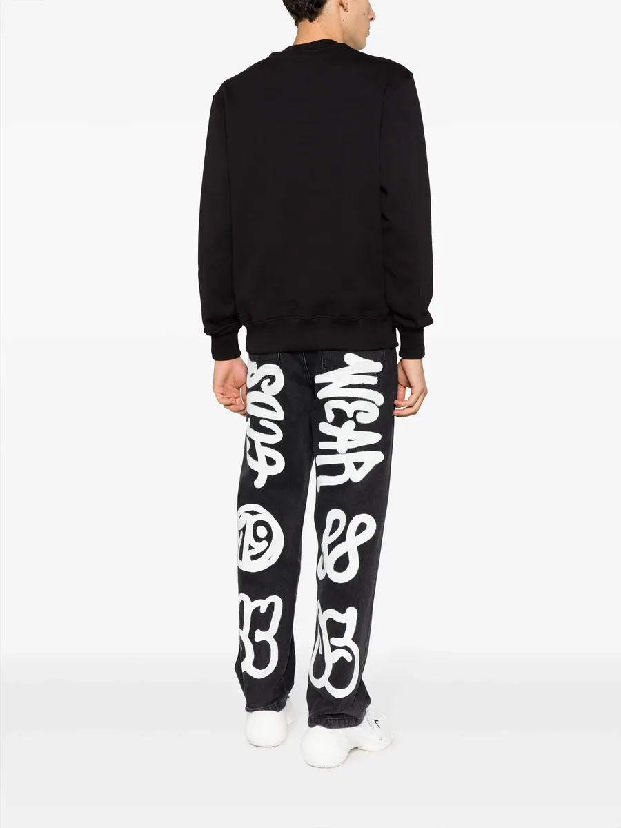 graffiti-print wide-leg jeans 4