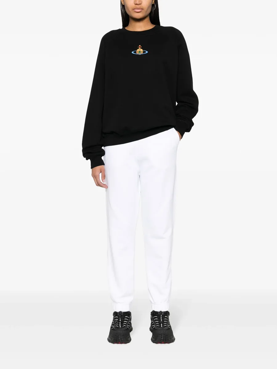 Orb-embroidered cotton track pants 5