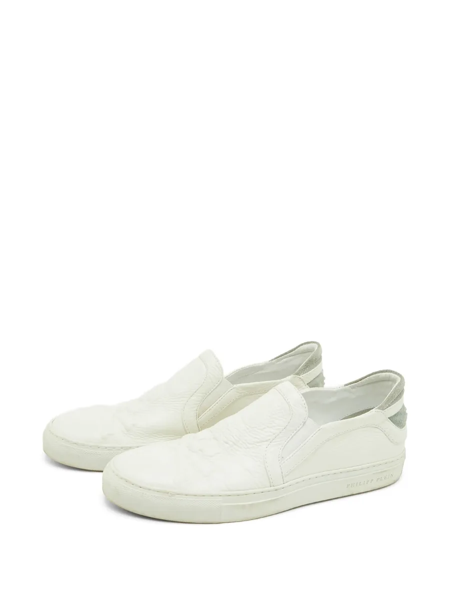 skull-embossed slip-on sneakers 5