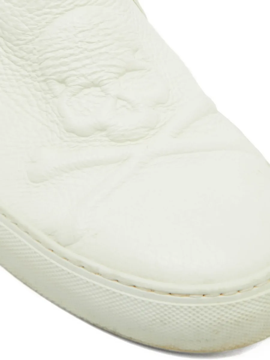 skull-embossed slip-on sneakers 10