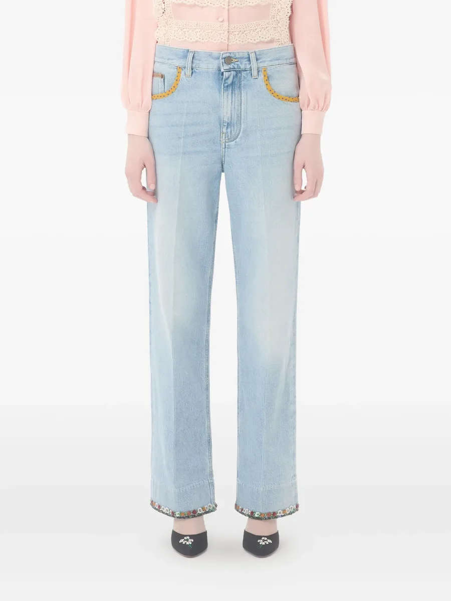 floral-hem faded jeans 7